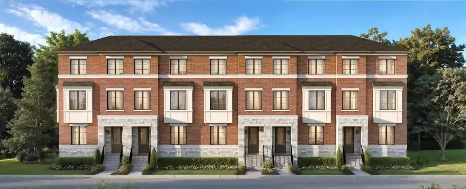 Front elevation of red brick townhomes